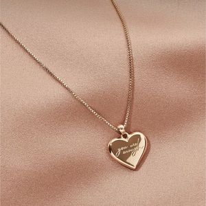 Olive and Piper Gold Amour Pendant Necklace